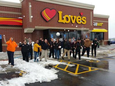 Snowfall at Love's Travel Stops opening in Valley, Nebraska