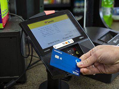 person using contactless payment option on in-store key pad at Love's Travel Stops