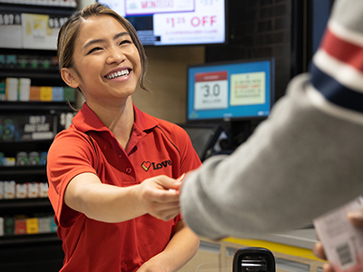 A Love's employee helping a customer