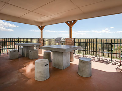 Pecos outdoor area with seating and grills